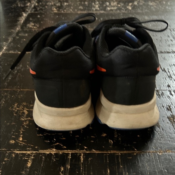 Nike Black and Blue Running Shoes with Vibrant Orange Logo - Picture 3 of 7